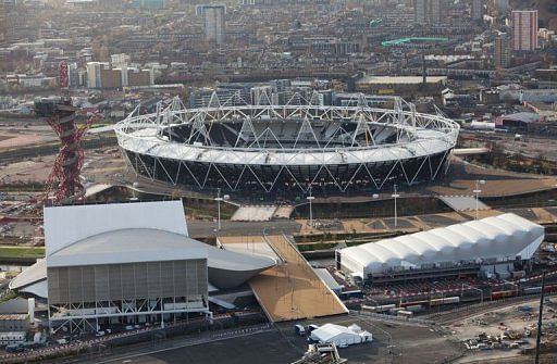 The London 2012 Olympic Stadium (C) the Water Polo Arena (R), the Aquatics Centre (L) in London