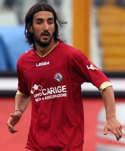 Livorno midfielder Piermario Morosini pictured playing before his heart-attack in Pescara on Saturday