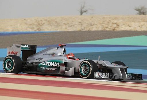 Michael Schumacher drives at the Bahrain International circuit in Manama Michael Schumacher drives at the Bahrain International circuit in Manama