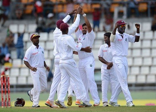 West Indies bowler Ravi Rampaul (C) celebrates with teammates after taking the wicket of Australian batsman Ed Cowan West Indies bowler Ravi Rampaul (C) celebrates with teammates after taking the wicket of Australian batsman Ed Cowan