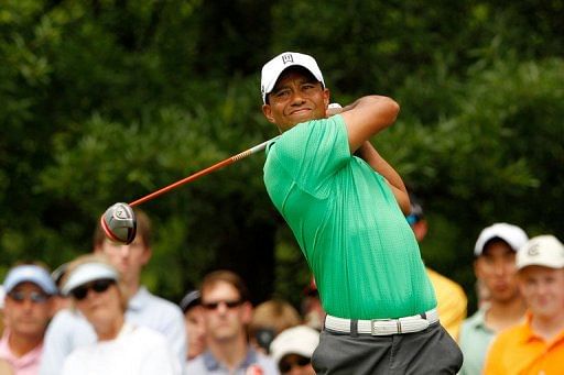 Tiger Woods of the United States hits his tee shot on the eighth hole Tiger Woods of the United States hits his tee shot on the eighth hole