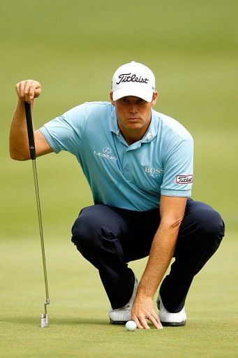 Nick Watney of the United States lines up his putt on the tenth green Nick Watney of the United States lines up his putt on the tenth green
