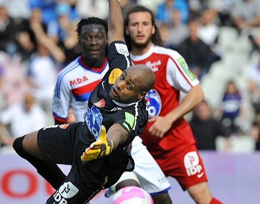 Brest's goalkeeper Steeve Elana tries to stop a shot Brest's goalkeeper Steeve Elana tries to stop a shot