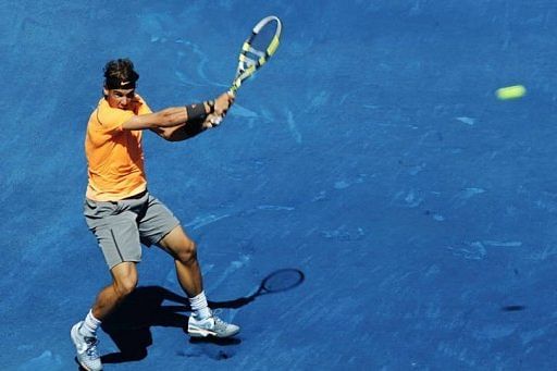 Spanish Rafael Nadal returns a ball to Spanish Fernando Verdasco Spanish Rafael Nadal returns a ball to Spanish Fernando Verdasco