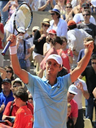 France's Edouard Roger-Vasselin celebrates after beating Canada's Vasek Pospisil France's Edouard Roger-Vasselin celebrates after beating Canada's Vasek Pospisil