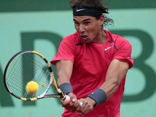 Defending champion Rafael Nadal has stormed into the French Open quarter-finals Defending champion Rafael Nadal has stormed into the French Open quarter-finals