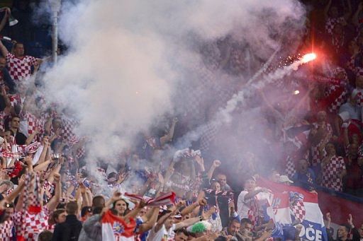 Croatia's ecstatic fans let off flares to celebrate Mandzukic's goal, and did so again to mark the ensuing strikes Croatia's ecstatic fans let off flares to celebrate Mandzukic's goal, and did so again to mark the ensuing strikes