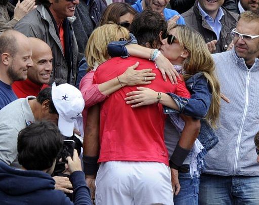 Nadal celebrates his win with his sister (right) and mother (left) Nadal celebrates his win with his sister (right) and mother (left)