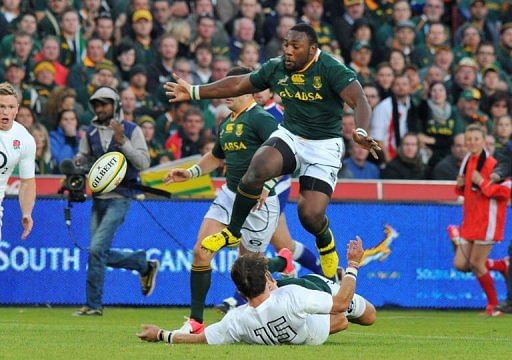 South Africa's JP Pietersen (top) jumps over England's Ben Foden South Africa's JP Pietersen (top) jumps over England's Ben Foden
