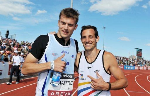 Christophe Lemaitre (L) poses with pole vaulter Renaud Lavilenie Christophe Lemaitre (L) poses with pole vaulter Renaud Lavilenie