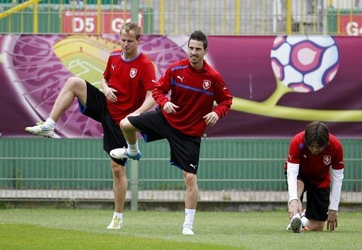 Czech midfielders Tomas Hubschman, Milan Petrzela and Tomas Rosicky, seen during a training session in Wroclaw Czech midfielders Tomas Hubschman, Milan Petrzela and Tomas Rosicky, seen during a training session in Wroclaw