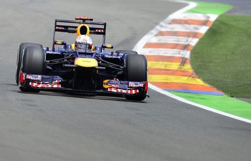 Red Bull Racing's German driver Sebastian Vettel drives at the Valencia Street Circuit Red Bull Racing's German driver Sebastian Vettel drives at the Valencia Street Circuit