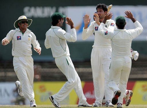 Pakistan's Junaid Khan (second right) celebrates after taking the wicket of Sri Lanka's Tharanga Paranavitana Pakistan's Junaid Khan (second right) celebrates after taking the wicket of Sri Lanka's Tharanga Paranavitana
