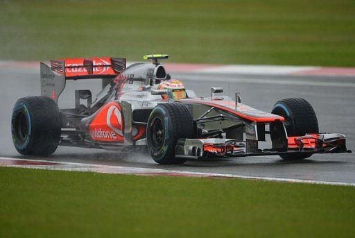 McLaren Mercedes' British driver Lewis Hamilton drives McLaren Mercedes' British driver Lewis Hamilton drives