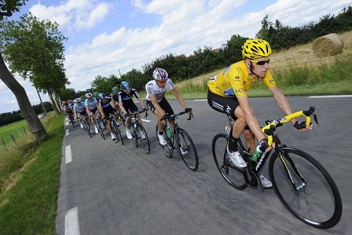 Bradley Wiggins rides in the pack with teammates of British Sky cycling team Bradley Wiggins rides in the pack with teammates of British Sky cycling team