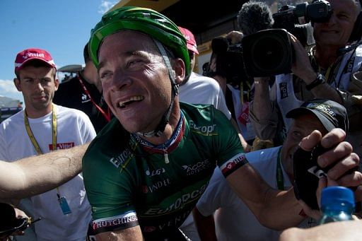 Stage winner, France's Thomas Voeckler, celebrates after he crossed the finish line Stage winner, France's Thomas Voeckler, celebrates after he crossed the finish line