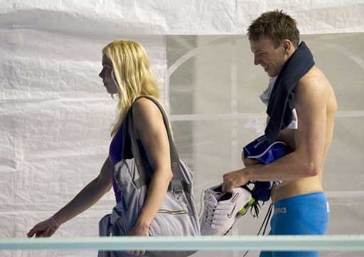 Paul Biedermann (R) with his partner swimmer Britta Steffen at May's German Swimming Championships Paul Biedermann (R) with his partner swimmer Britta Steffen at May's German Swimming Championships