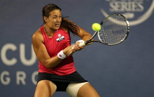 Marion Bartoli competed with a thigh strapping after suffering an injury in her match the day before Marion Bartoli competed with a thigh strapping after suffering an injury in her match the day before