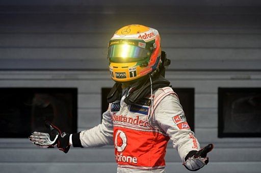 Lewis Hamilton celebrates in the parc ferme Lewis Hamilton celebrates in the parc ferme