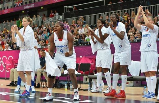 French players cheer their teammates during the Women's preliminary round group B basketball match French players cheer their teammates during the Women's preliminary round group B basketball match