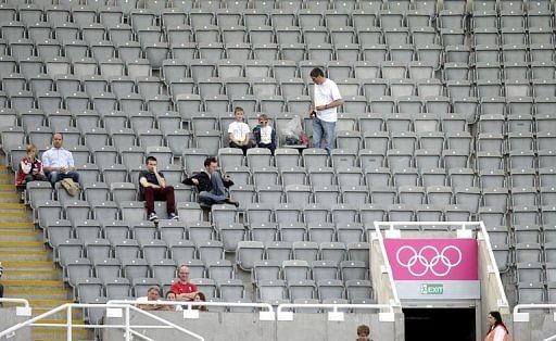 A photo taken on July 29 shows empty seats during the men's football match between Japan and Morocco A photo taken on July 29 shows empty seats during the men's football match between Japan and Morocco