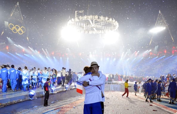 Two French athletes hug during the athle
