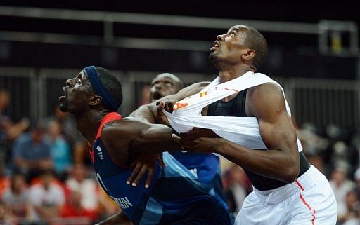 British forward Pops Mensah-Bonsu (L) Spanish centre Serge Ibaka British forward Pops Mensah-Bonsu (L) Spanish centre Serge Ibaka