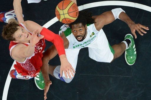 Russian centre Timofey Mozgov (L) vies with Brazilian centre Tiago Splitter Russian centre Timofey Mozgov (L) vies with Brazilian centre Tiago Splitter