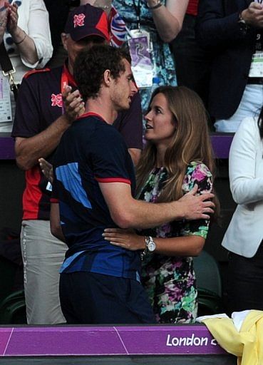 Andy Murray hugs his girlfriend Kim Sears after winning his first Olympic gold medal with a demolition of Roger Federer Andy Murray hugs his girlfriend Kim Sears after winning his first Olympic gold medal with a demolition of Roger Federer