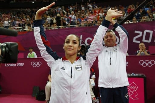 US gymnast Alexandra Raisman celebrates winning gold
