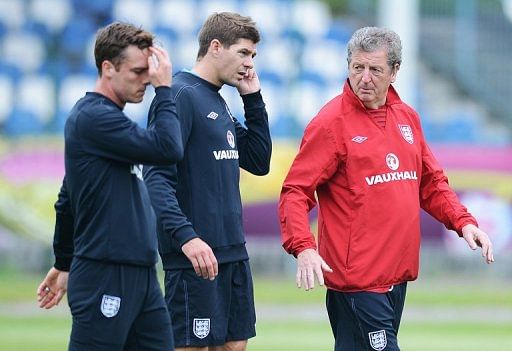 Roy Hodgson with Steven Gerrard and Scott Parker Roy Hodgson with Steven Gerrard and Scott Parker
