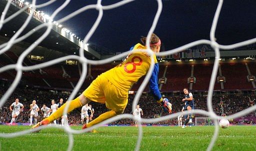 US forward Abby Wambach (R) scores from a penalty US forward Abby Wambach (R) scores from a penalty