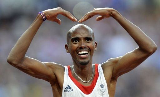 Britain's Mohamed Farah celebrates after winning the men's 5000m Britain's Mohamed Farah celebrates after winning the men's 5000m