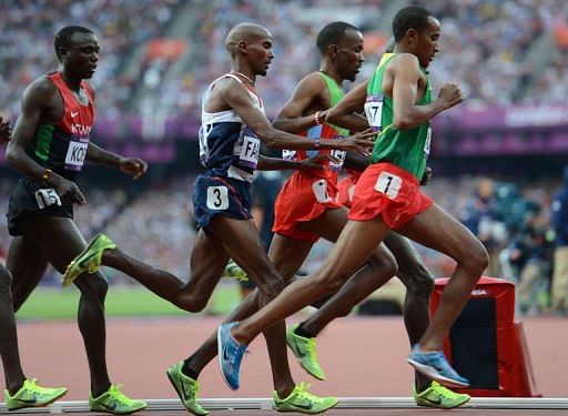 Britain's Mohamed Farah (C) competes in the men's 5000m final Britain's Mohamed Farah (C) competes in the men's 5000m final