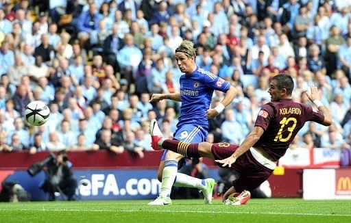 Chelsea striker Fernando Torres scores the opening goal during Community Shield against Manchester City at Villa Park Chelsea striker Fernando Torres scores the opening goal during Community Shield against Manchester City at Villa Park