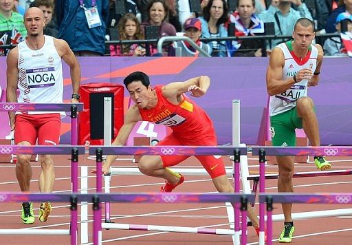 Liu Xiang limped out of the 110m hurdles for the second Games running Liu Xiang limped out of the 110m hurdles for the second Games running