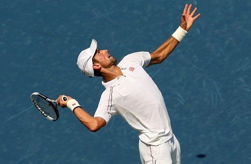 Novak Djokovic of Serbia serves to Andreas Seppi of Italy Novak Djokovic of Serbia serves to Andreas Seppi of Italy
