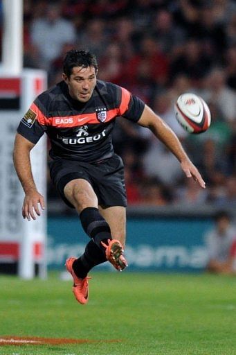 Toulouse's fly-half Lionel Beauxis kicks the ball Toulouse's fly-half Lionel Beauxis kicks the ball