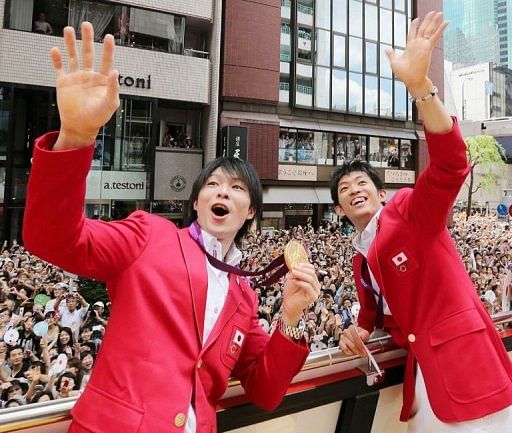 Japan wants the 2020 Olympics and hopes the success of athletes like Kohei Uchimura (L) and Kazuhito Tanaka (R) can help Japan wants the 2020 Olympics and hopes the success of athletes like Kohei Uchimura (L) and Kazuhito Tanaka (R) can help