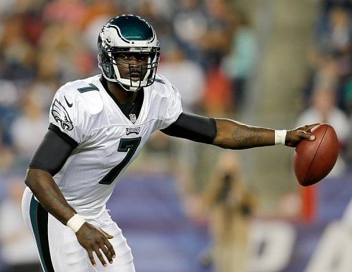 Michael Vick of the Philadelphia Eagles looks for an open man against the New England Patriots Michael Vick of the Philadelphia Eagles looks for an open man against the New England Patriots
