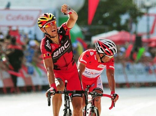 Belgium's Philippe Gilbert (L) of BMC Racing team reacts as he crosses the finish line Belgium's Philippe Gilbert (L) of BMC Racing team reacts as he crosses the finish line