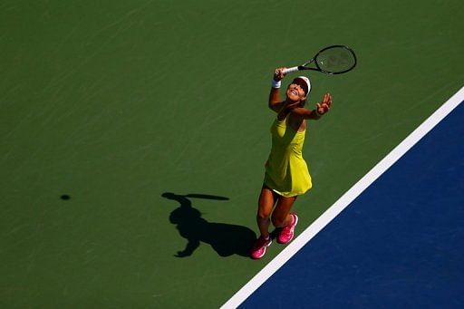Ana Ivanovic of Serbia serves Ana Ivanovic of Serbia serves