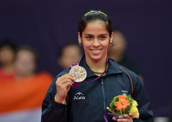 India's Saina Nehwal poses with her bron