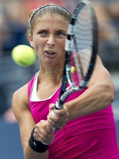 Sara Errani of Italy hits a return to Angelique Kerber of Germany Sara Errani of Italy hits a return to Angelique Kerber of Germany