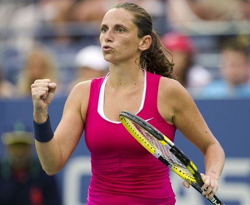 Roberta Vinci of Italy reacts to a point against Agnieszka Radwanska of Poland Roberta Vinci of Italy reacts to a point against Agnieszka Radwanska of Poland