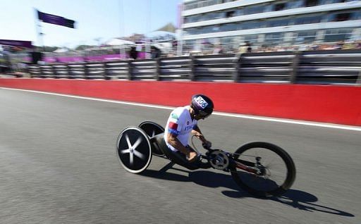 Italy's Alessandro Zanardi heads to victory in the men's individual H4 time trial cycling final Italy's Alessandro Zanardi heads to victory in the men's individual H4 time trial cycling final