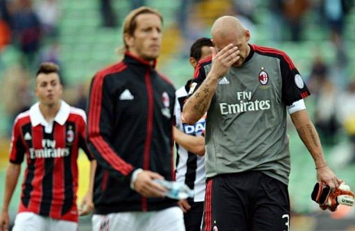 AC Milan's goalkeeper Christian Abbiati (R) AC Milan's goalkeeper Christian Abbiati (R)