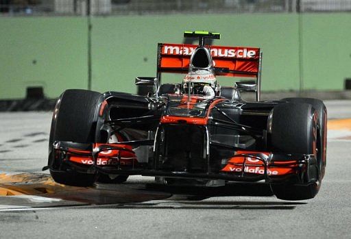 Lewis Hamilton powers his car during Formula One's Singapore Grand Prix Lewis Hamilton powers his car during Formula One's Singapore Grand Prix