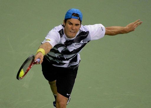 Tommy Haas of Germany returns against Nicolas Almagro of Spain Tommy Haas of Germany returns against Nicolas Almagro of Spain