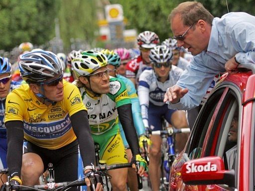 Christian Prudhomme (R) talks to Lance Armstrong during the 92nd Tour de France in 2005 Christian Prudhomme (R) talks to Lance Armstrong during the 92nd Tour de France in 2005